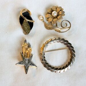 Set of 4 vintage brooches in gold and silver tones with a mix of styles jewelry
